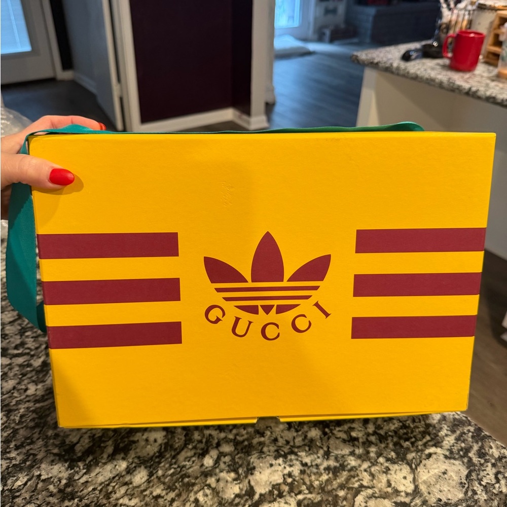 Gucci Yellow Box with Burgundy Logo and Teal Ribbon